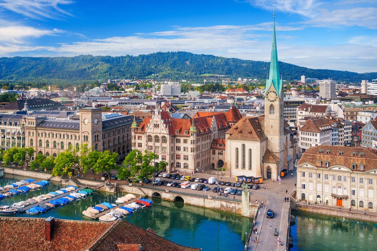 Zurich, Switzerland Cityscape on the Limmat River - Learn how to open a Swiss bank account from abroad for secure and reliable banking solutions.