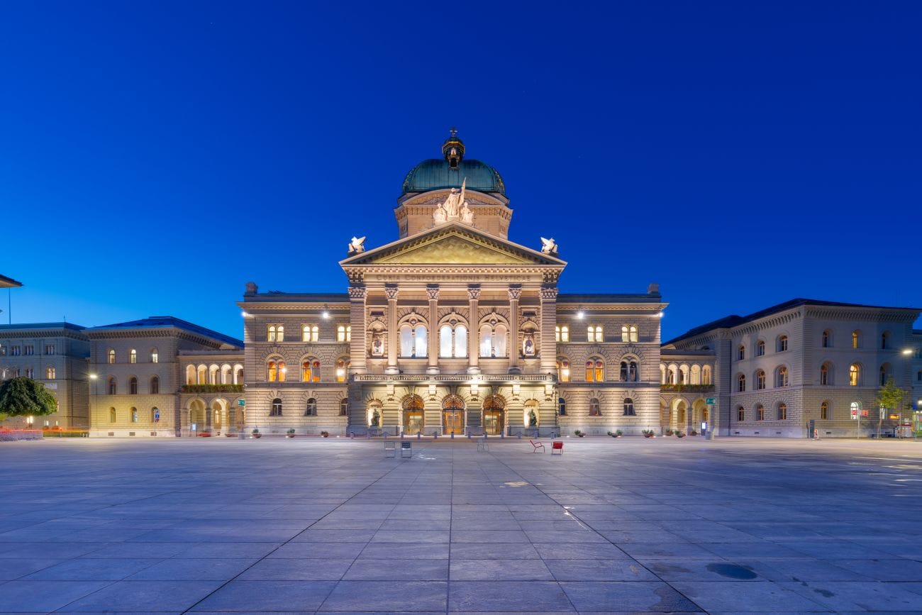Bern, Switzerland at blue hour showing the Federal Palace, reflecting Swiss Banking Laws.