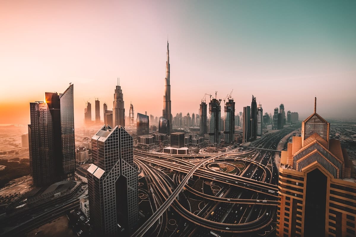 Dubai skyline at sunset representing tax-free living and wealth management in the UAE for 2025
