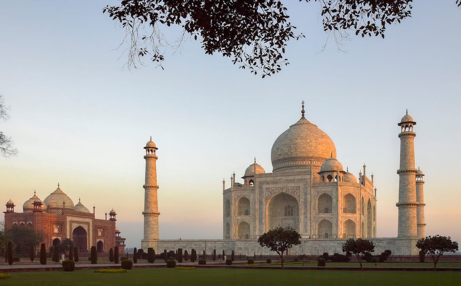 The Taj Mahal at sunrise, representing the target demographic for opening a Swiss bank account for Indian nationals and NRIs.