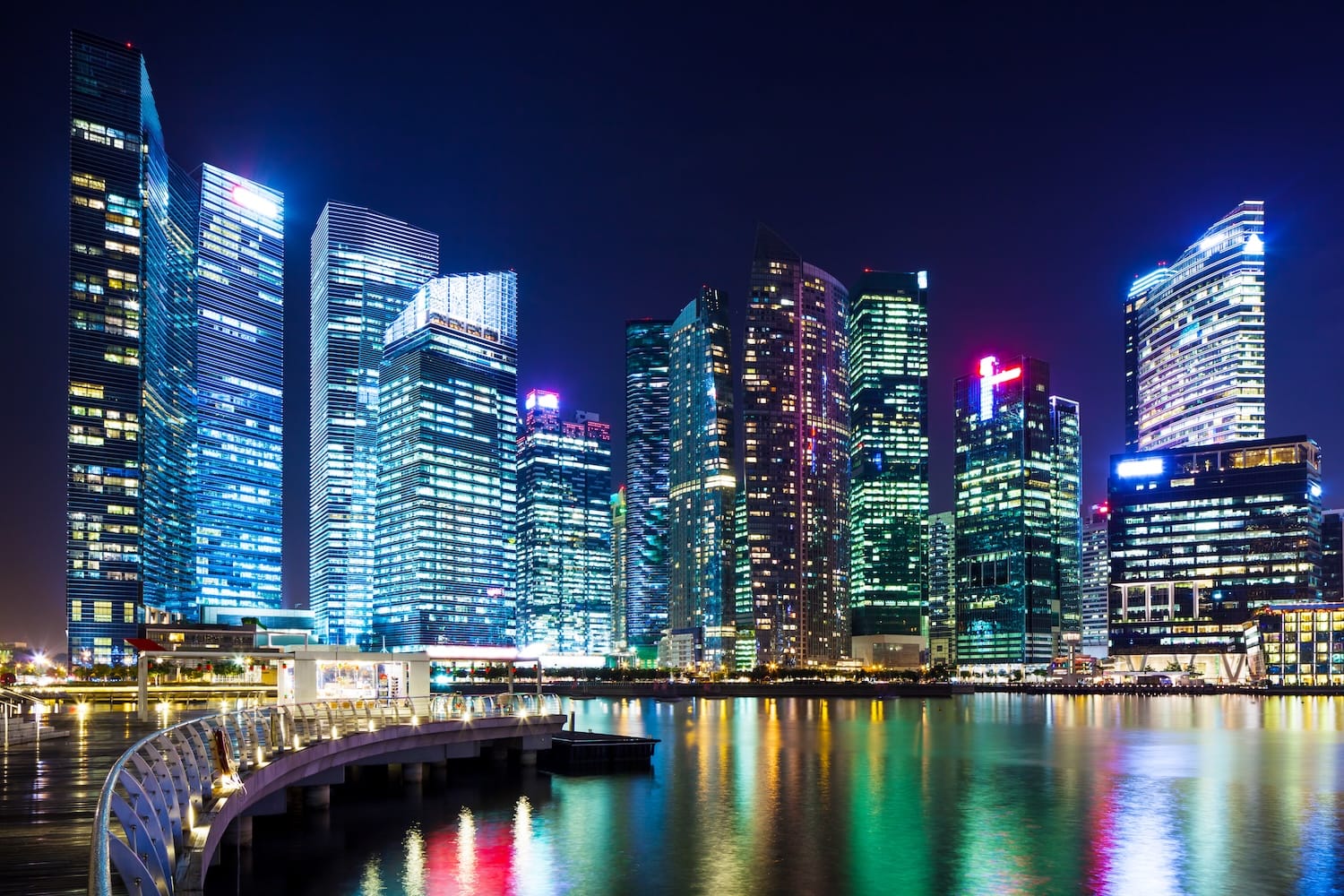 Singapore skyline at night highlighting DBS as a digital leader bank in Singapore with modern financial district buildings