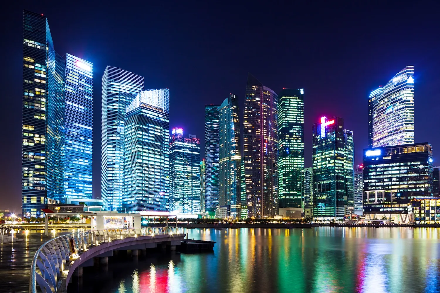 Singapore skyline at night highlighting DBS as a digital leader bank in Singapore with modern financial district buildings