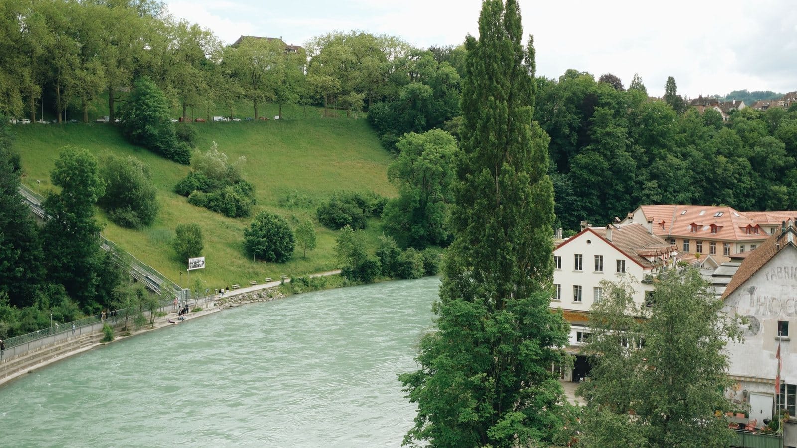 Swiss riverside homes and local economy connected to cantonal bank mortgage lending